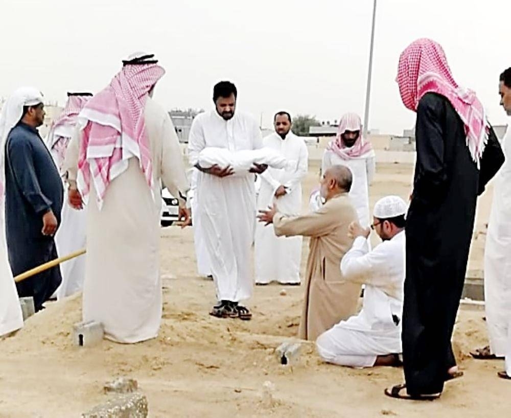 


Hussain Al-Abdul Azeem buries his son in Al-Ahsa.