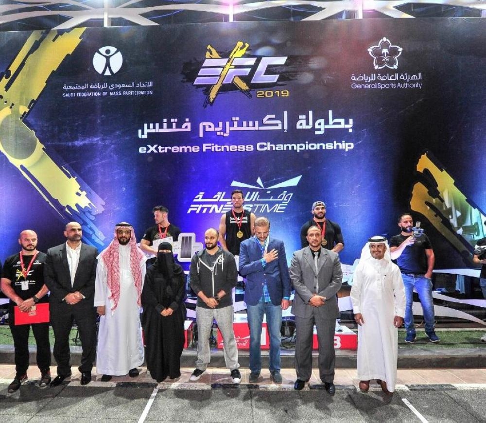 Trainers and contestants with Prince Khaled Bin Al Waleed