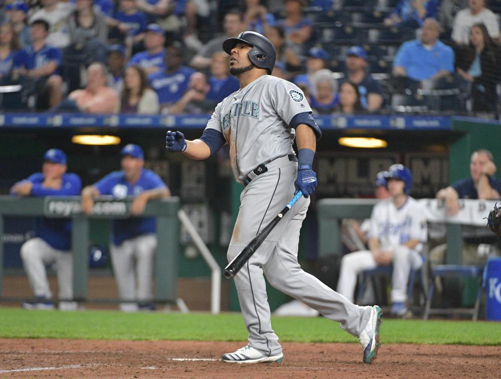 Seattle Mariners’ designated hitter Edwin Encarnacion watches his three-run home run in the sixth inning against the Kansas City Royals at Kauffman Stadium in Kansas City Monday. — Reuters