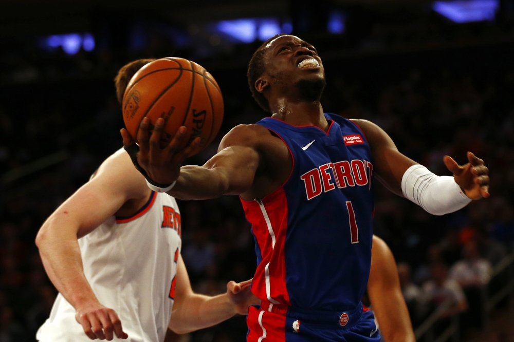 Detroit Pistons guard Reggie Jackson (1) drives to the basket against the New York Knicks during the first half at Madison Square Garden. — Reuters