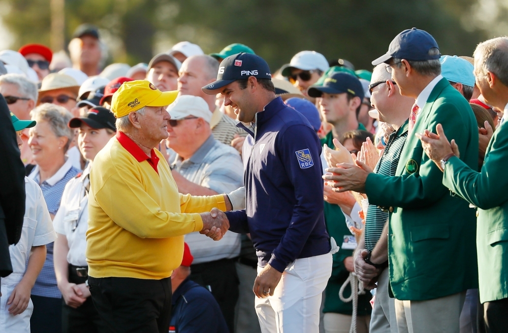 Honorary starter and Masters champion Jack Nicklaus greets Masters champion Patrick Reed of the United States on the first tee during the First Tee ceremony to start the first round of the Masters at Augusta National Golf Club on Thursday in Augusta, Georgia. — AFP