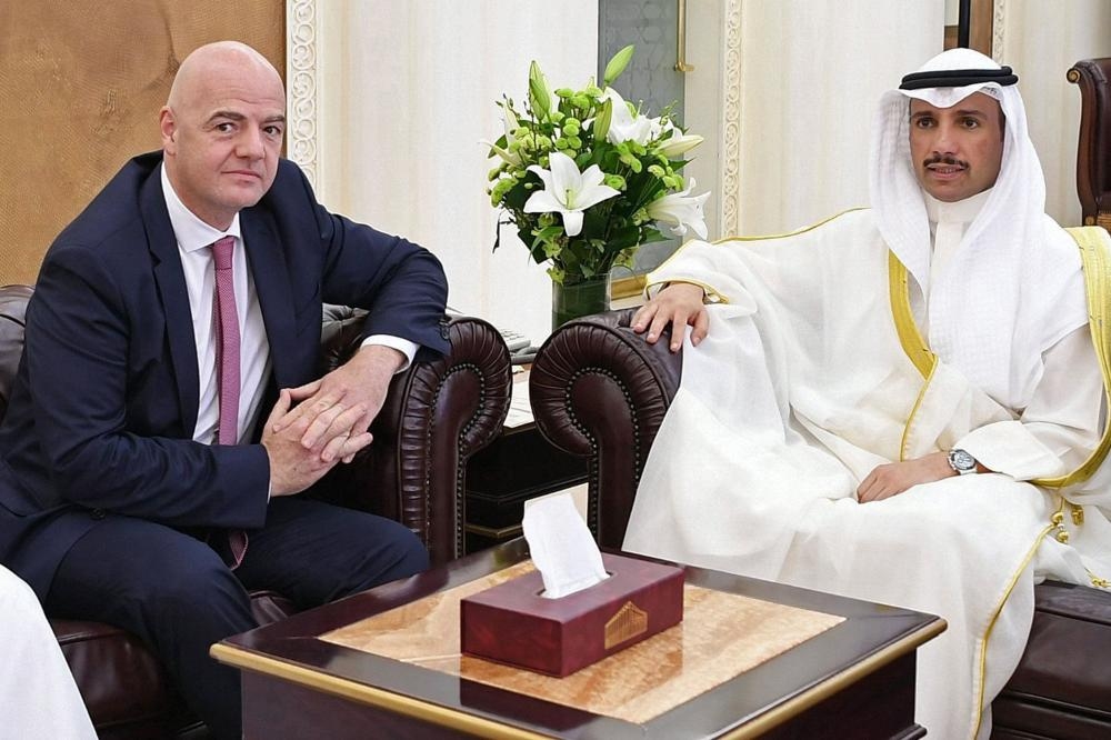 Kuwait's parliament speaker Marzouq Al-Ghanim (R) meeting with FIFA President Gianni Infantino at the Kuwait national assembly in Kuwait City Sunday. — AFP