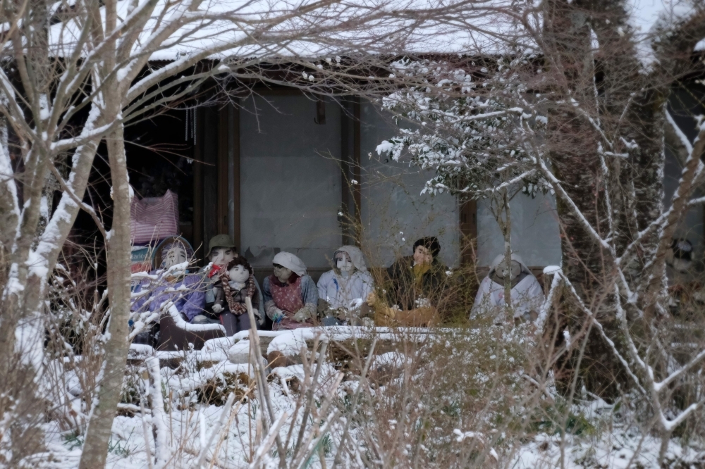 Life-size dolls are displayed at a house veranda in the tiny village of Nagoro in western Japan, in this March 16, 2019 file photo. — AFP