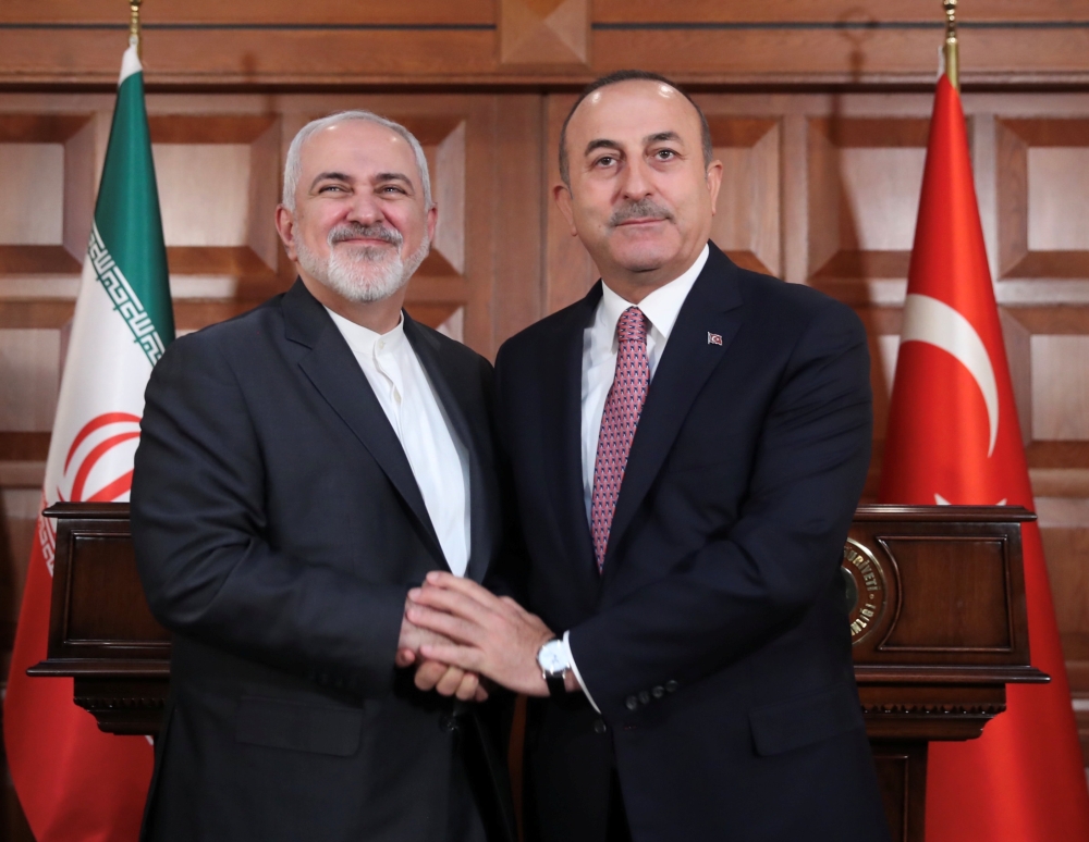 Turkish Foreign Minister Mevlut Cavusoglu meets with his Iranian counterpart Mohammad Javad Zarif in Ankara on Wednesday. — Reuters