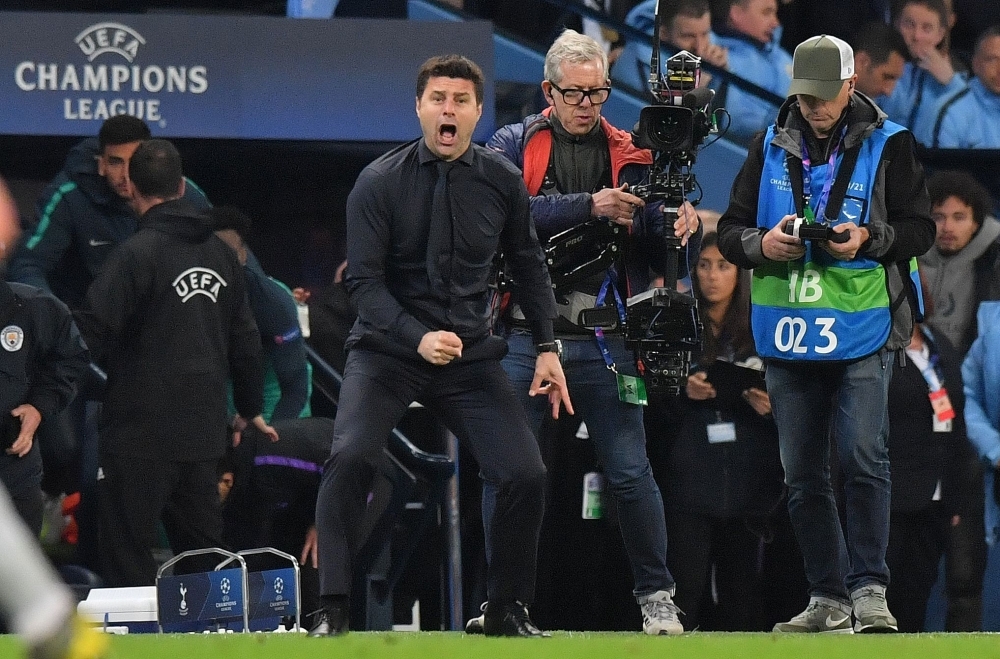 Tottenham Hotspur's Argentinian head coach Mauricio Pochettino celebrates at the final whistle during the UEFA Champions League quarterfinal second leg football match between Manchester City and Tottenham Hotspur at the Etihad Stadium in Manchester, north west England. The match ended 4-4, but Tottenham progress to the semifinals on goal difference. — AFP