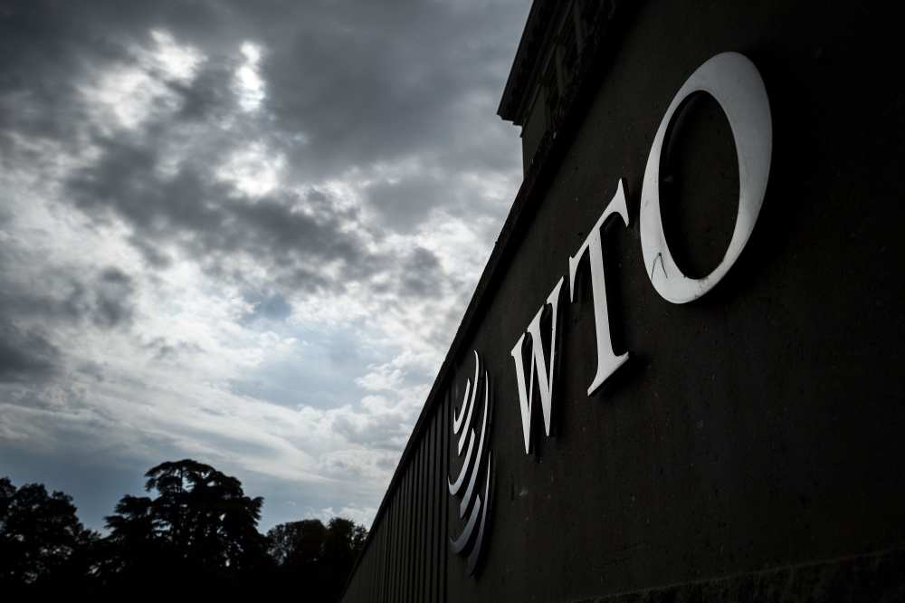 In this file photo, a sign of the World Trade Organization (WTO) is seen at their headquarters in Geneva. The World Trade Organization on Thursday largely sided with the United States in its Obama-era case against Beijing over Chinese restrictions on imports of American grain. The WTO decision was the second in as many months to favor Washington's position on trade with China in grain.  — AFP