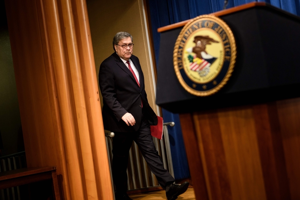 US Attorney General William Barr arrives for a press conference about the release of the Mueller Report at the Department of Justice in Washington on Thursday. — AFP