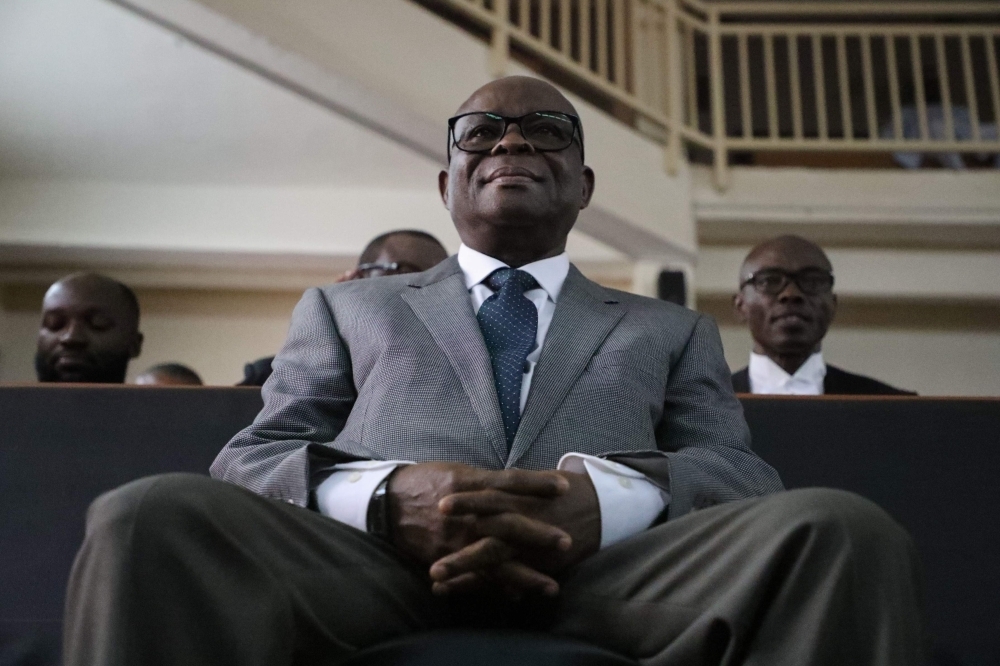 Suspended Chief Justice of Nigeria (CJN) Walter Samuel Nkanu Onnoghen, right, appears at the Code of Conduct Tribunal during his final judgement on corruption allegations in Abuja on Thursday. — AFP