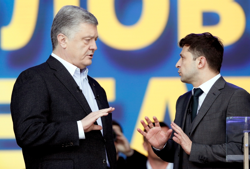 Ukraine’s President and presidential candidate Petro Poroshenko attends a policy debate with his rival, comedian Volodymyr Zelenskiy, at the National Sports Complex Olimpiyskiy stadium in Kiev, Ukraine, on Friday. — Reuters