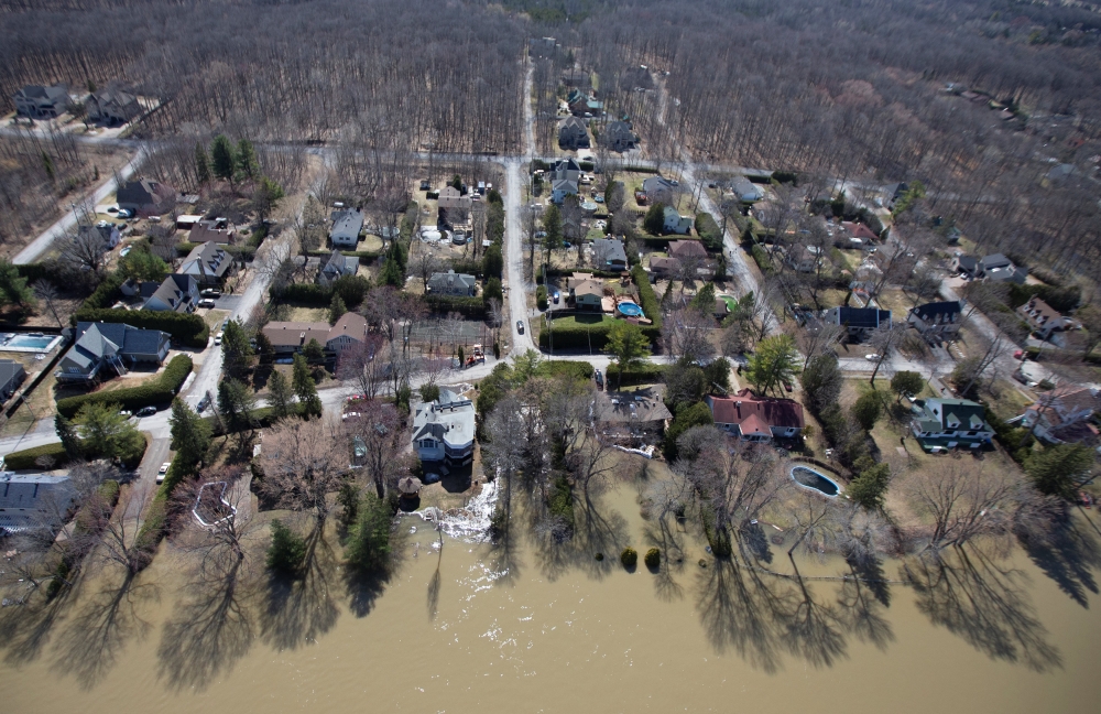 A view from a Canadian Forces helicopter shows the flooding in the region of Laval, Quebec, Canada,  on Sunday. — Reuters
