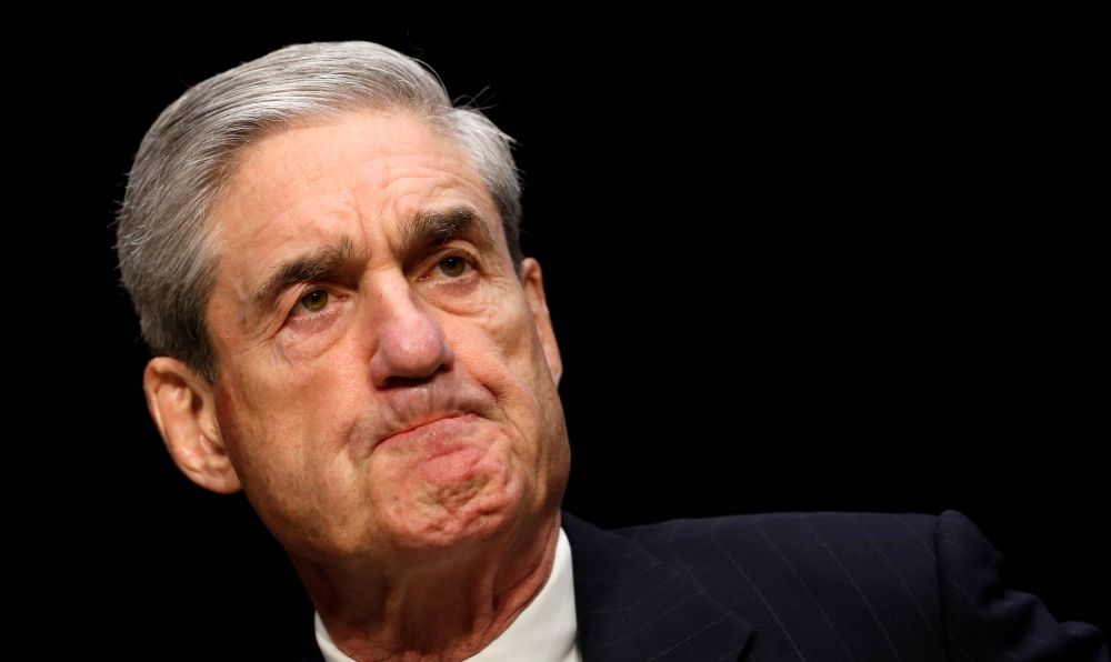 Robert Mueller, as FBI director, testifies before a Senate Intelligence Committee hearing on Capitol Hill in Washington in this March 12, 2013 file photo. — Reuters