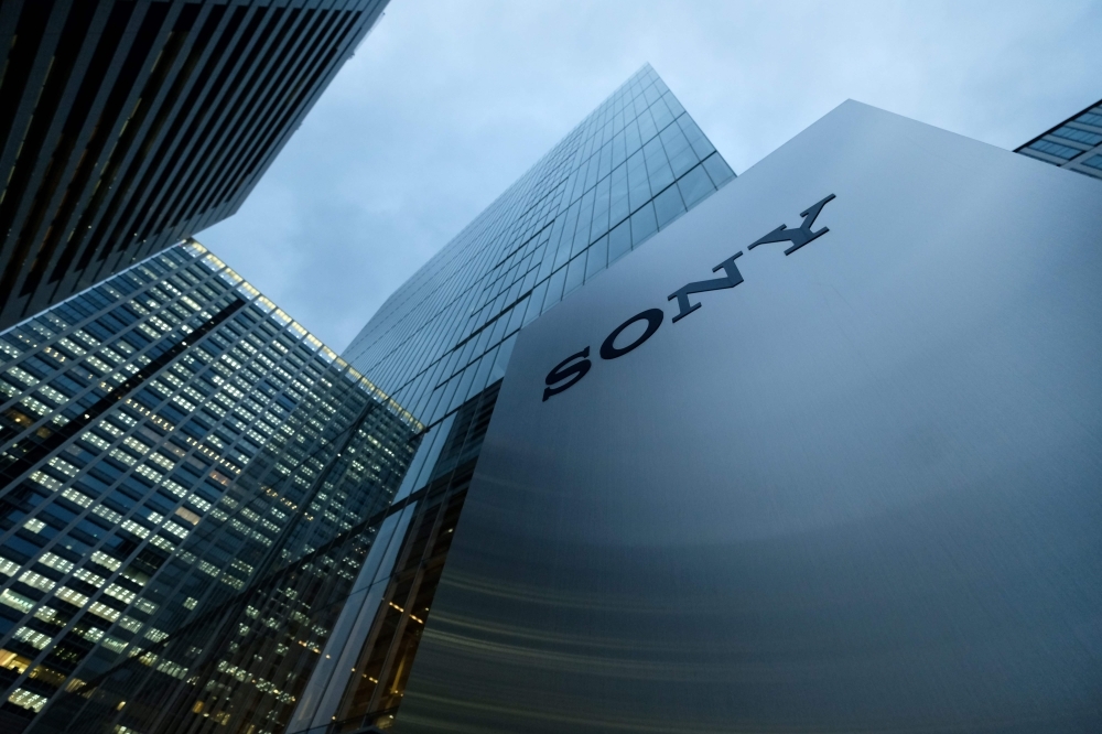 This file photo shows the logo of Japan's Sony Corp. displayed in front of the company's headquarters in Tokyo. Japan's Sony said on Friday that its annual profits had climbed to record highs for the second consecutive year thanks to a robust performance of its entertainment business. — AFP