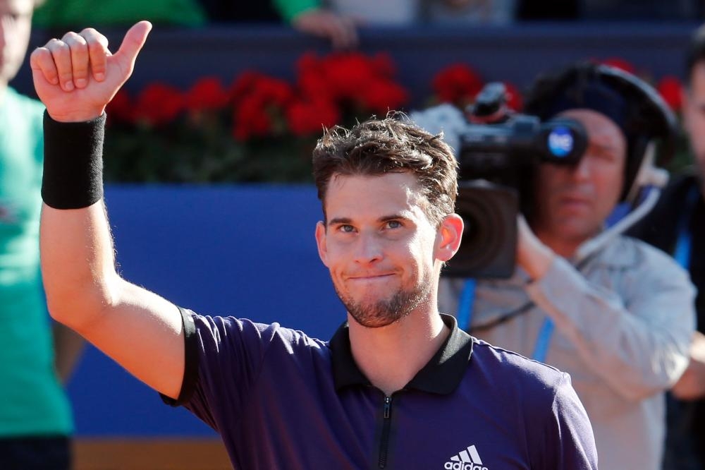 Austria's Dominic Thiem celebrates winning over Spain's Rafael Nadal at the ATP Tour Barcelona Open semifinal match in Barcelona Saturday. — AFP 