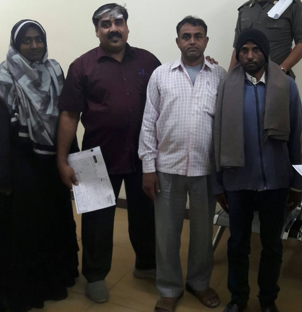 Shoukat Nass, second from left, with some of his compatriots who needed his assistance.