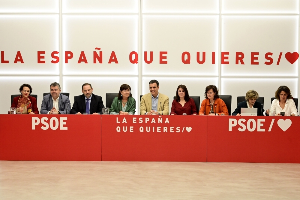 Spanish Prime Minister Pedro Sanchez, center, chairs a Socialist Party (PSOE) meeting in Madrid on Monday a day after winning general elections.  — AFP