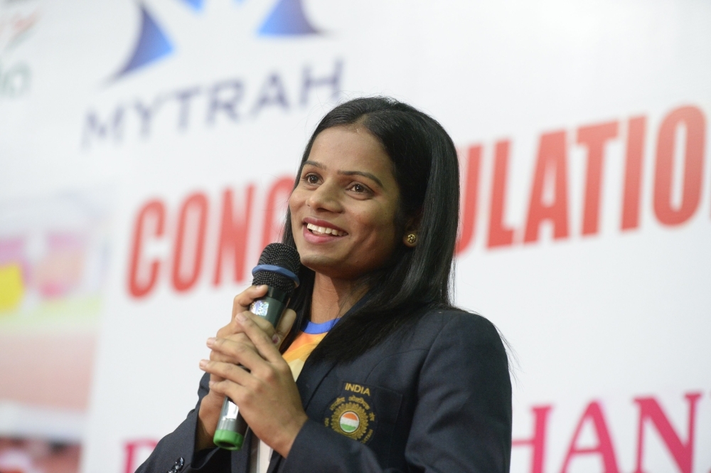 In this file photo, Indian sprinter Dutee Chand speaks during a press conference in Hyderabad. Indian gender-row sprinter Dutee Chand on Thursday said Caster Semenya's court defeat over testosterone rules was 