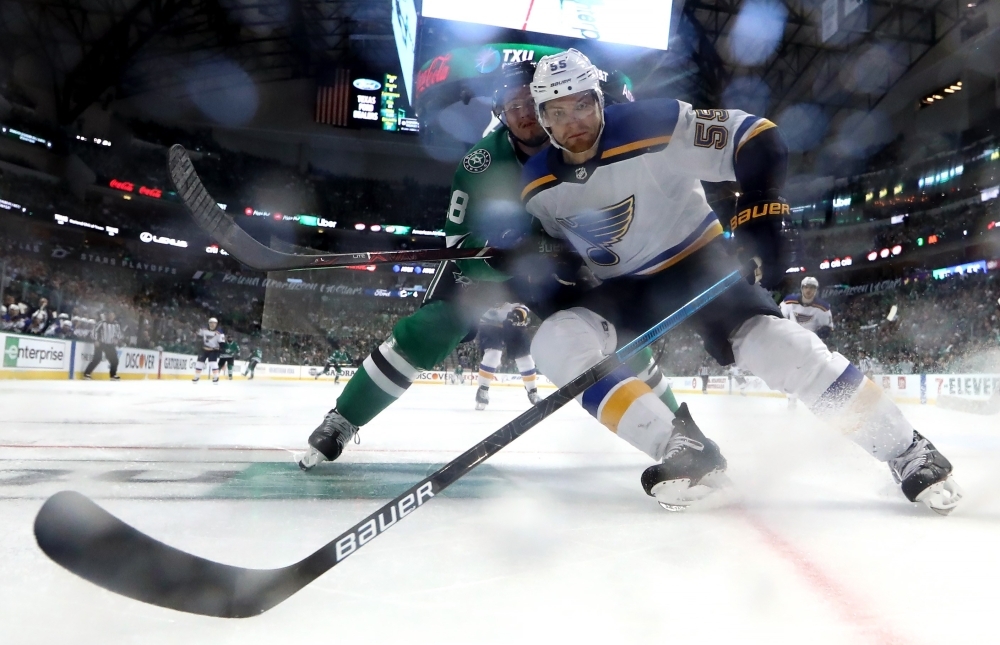 Colton Parayko No. 55 of the St. Louis Blues skates for the puck against Tyler Pitlick No. 18 of the Dallas Stars during the third period of Game Four of the Western Conference Second Round of the 2019 NHL Stanley Cup Playoffs at American Airlines Center on Wednesday in Dallas, Texas. — AFP