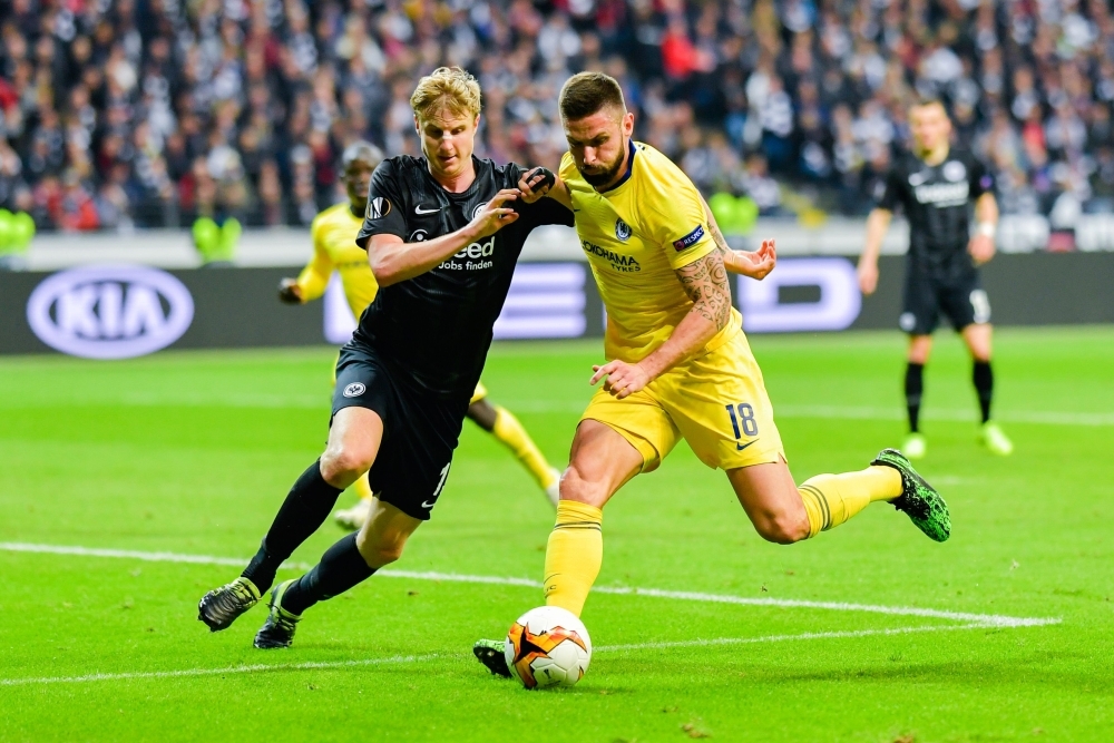 Chelsea's French striker Olivier Giroud (R) and Frankfurt's German defender Martin Hinteregger vie for the ball during the UEFA Europa League semifinal first leg football match in Frankfurt am Main, western Germany on Thursday.  – AFP