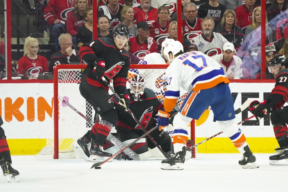 Carolina Hurricanes goaltender Curtis McElhinney (35) with defenseman Haydn Fleury (4) wait for the shot by New York Islanders left wing Matt Martin (17) in game four of the second round of the 2019 Stanley Cup Playoffs at PNC Arena. The Carolina Hurricanes defeated the New York Islanders 5-2. — Reuters