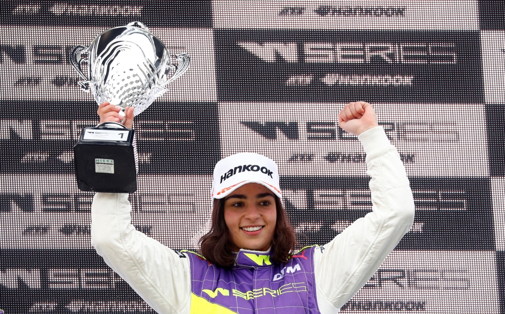 Britain's Jamie Chadwick celebrates with a trophy after winning the W Series race at the Hockenheim, Germany, on Saturday. — Reuters