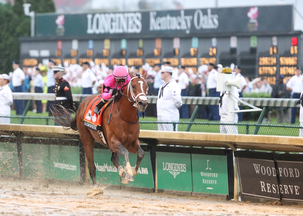 FILE PHOTO: May 4, 2019; Louisville, KY, USA; Luis Saez aboard Maximum Security (7) crosses the finish line during the 145th running of the Kentucky Derby at Churchill Downs. Mandatory Credit: Mark Zerof-USA TODAY Sports - 12643975/File Photo