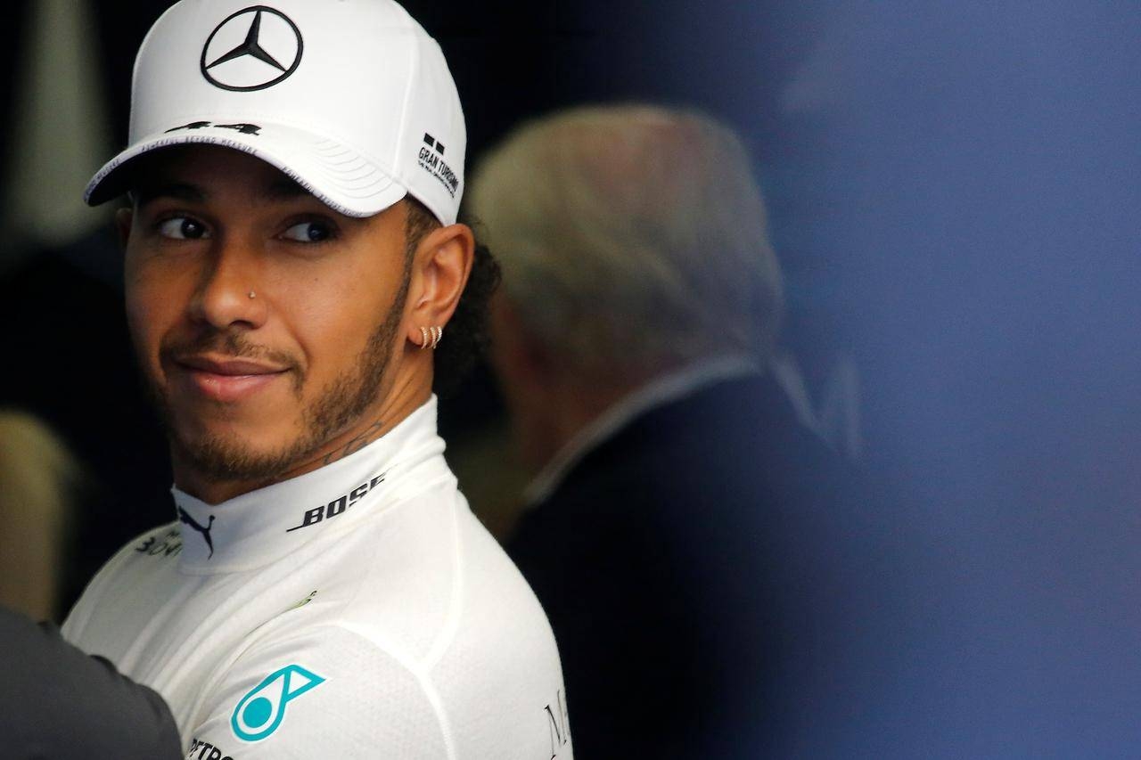 Lewis Hamilton is favorite to win the Spanish Grand Prix for a fourth time, and third in a row, on Sunday and retake the Formula One world championship lead from Mercedes team mate Valtteri Bottas.