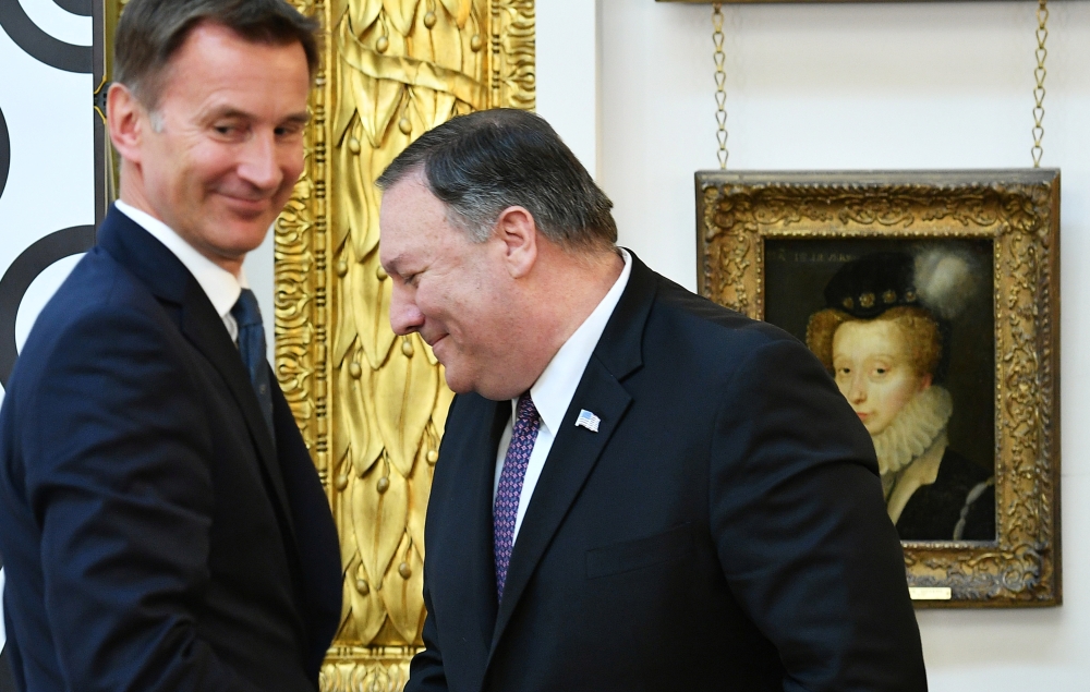 US Secretary of State Mike Pompeo and Britain’s Foreign Secretary Jeremy Hunt react during a joint news conference at the Foreign Office in central London on Wednesday. — Reuters