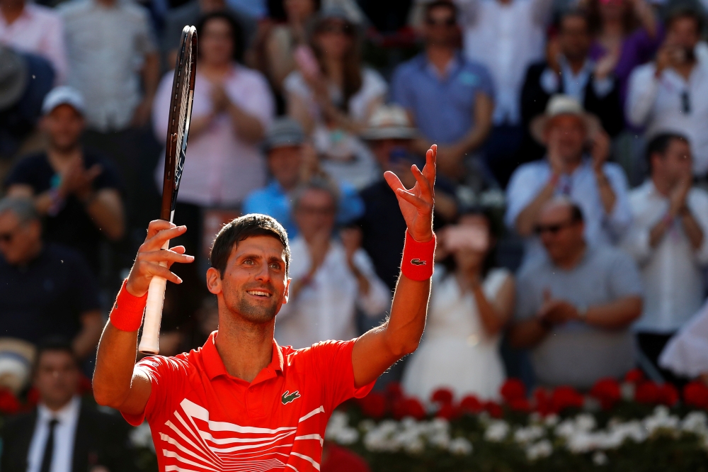 Serbia's Novak Djokovic celebrates winning his semifinal match against Austria's Dominic Thiem in the ATP 1000 - Madrid Open at the Caja Magica, Madrid, Spain, on Saturday. — Reuters