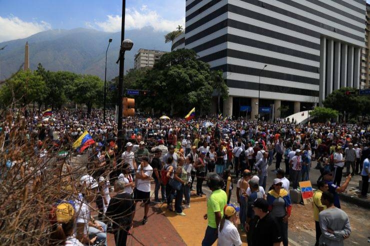 
Supporters of the opposition leader Juan Guaido, gather around La Carlota military air base to attend a protest in Caracas, Venezuela on April 30. – Courtesy photo
