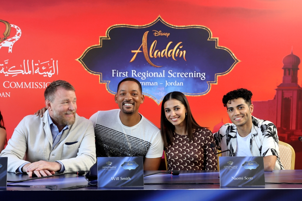 Director Guy Ritchie and cast members Will Smith, Naomi Scott and Mena Massoud of Disney's live-action 'Aladdin', attend a news conference in Amman, Jordan, Monday. — Reuters