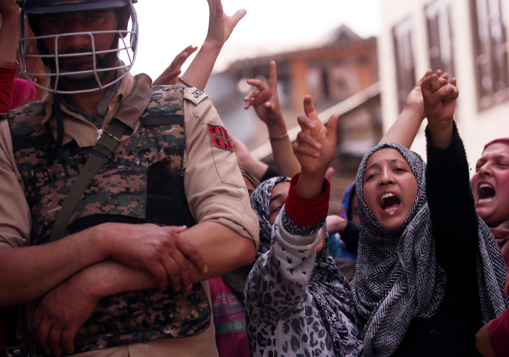 Kashmiri women shout slogans during a protest against the rape of a three-year old girl in Bandipora district last week in Srinagar on Monday. — Reuters