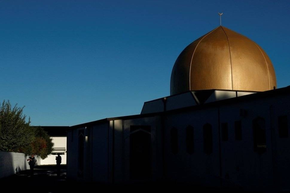 Armed police officers stand guard outside Al Noor mosque in Christchurch, New Zealand on April 1. - Reuters