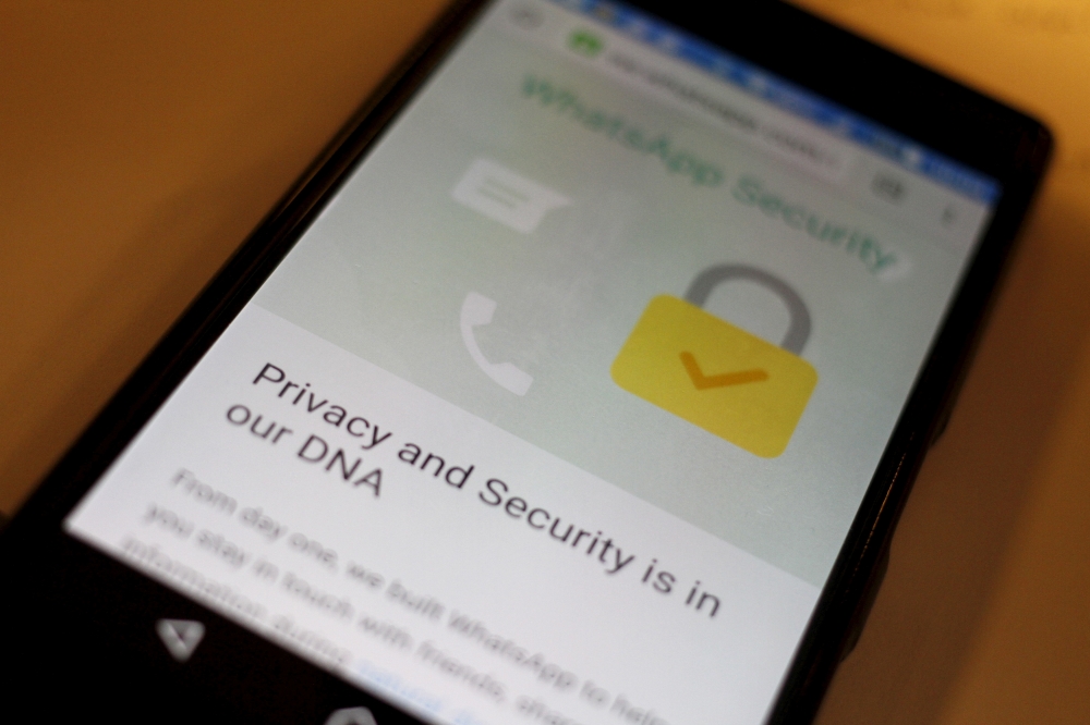 A security message is seen on a Whatsapp screen in this illustration photo April 6, 2016.  — Reuters