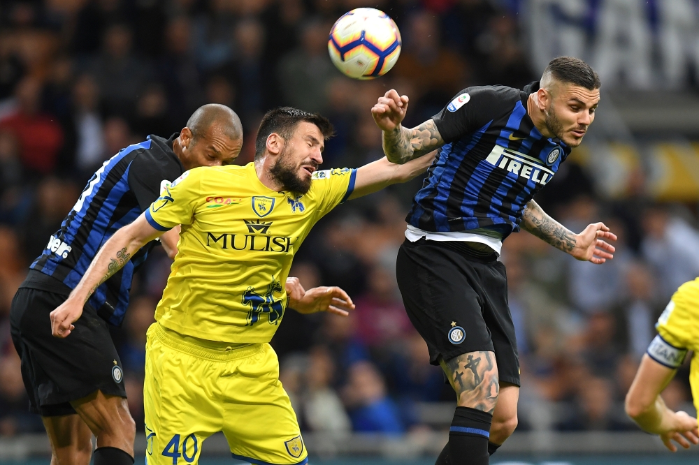 Inter Milan's Mauro Icardi in action with Chievo's Nenad Tomovic in San Siro, Milan, in this May 13, 2019 file photo. — Reuters