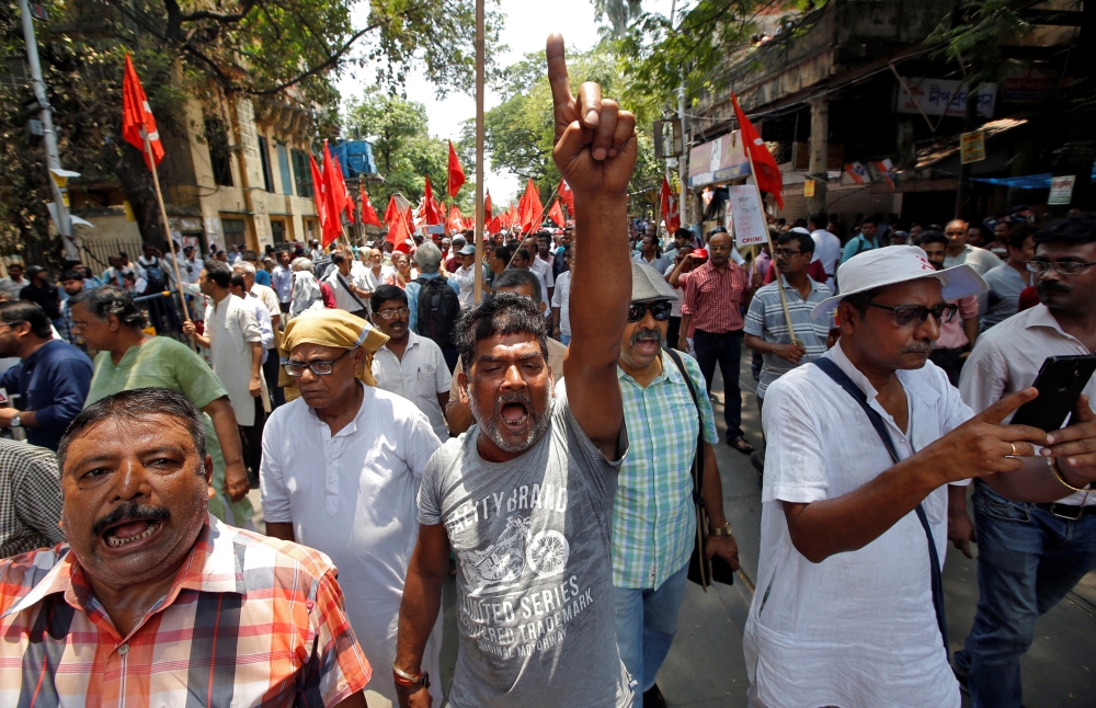 Supporters of the Communist Party of India-Marxist (CPI-M) shout slogans during a protest march after a statue of Ishwar Chandra Vidyasagar, an academic, was damaged during Tuesday's clashes between supporters of India's ruling Bharatiya Janata Party (BJP) and the Trinamool Congress, a major regional party, in Kolkata. — Reuters 