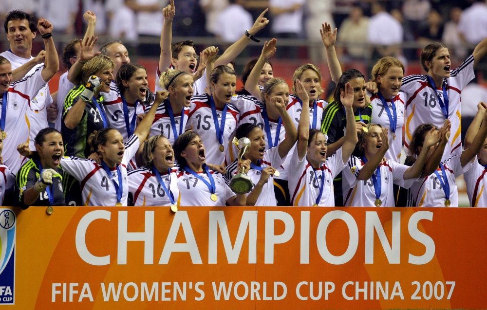 Germany's team celebrates after defeating Brazil in the final of the 2007 FIFA Women's World Cup soccer tournament in Shanghai in this file picture . — Reuters