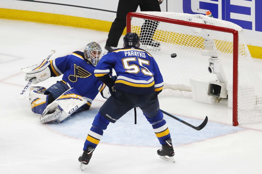 St. Louis Blues goaltender Jordan Binnington (50) and defenseman Colton Parayko (55) watch as a shot from San Jose Sharks defenseman Erik Karlsson (not pictured) goes in the net for the game-winning goal during overtime in game three of the Western Conference Final of the 2019 Stanley Cup Playoffs at Enterprise Center. — Reuters