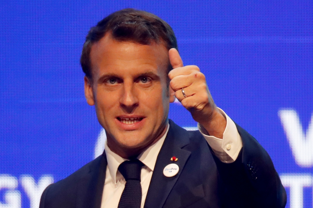 French President Emmanuel Macron gestures as he delivers a speech at the VivaTech startups and innovation fair in Paris, France, on Thursday. — Reuters