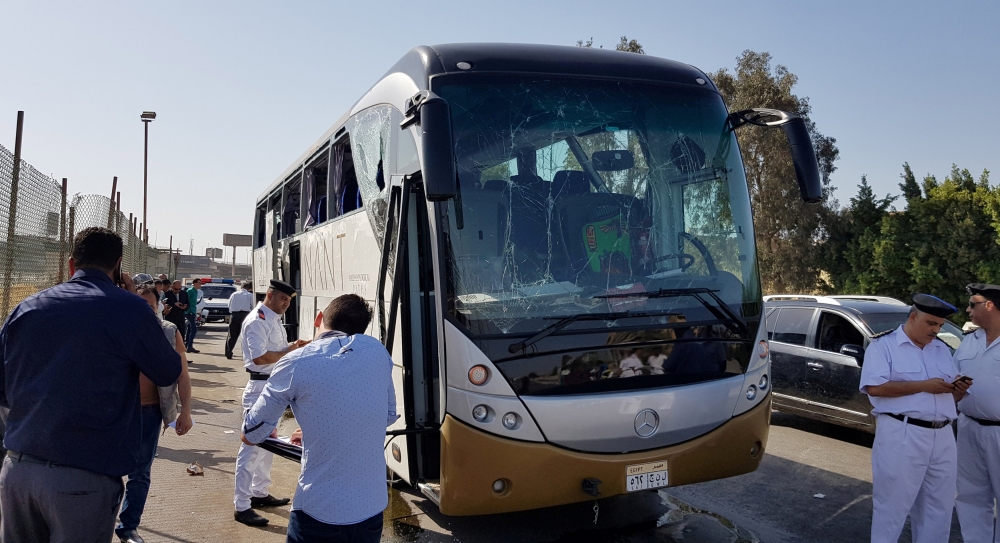 A damaged bus is seen at the site of a blast near a new museum being built close to the Giza pyramids in Cairo. — Reuters