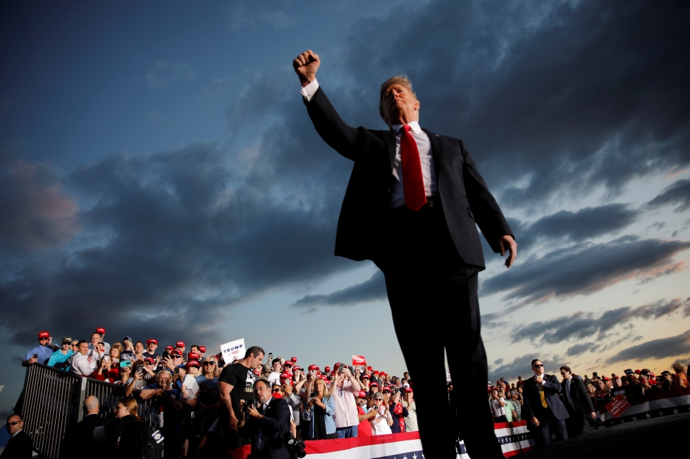 US President Donald Trump reacts as he addresses a Trump 2020 re-election campaign rally in Montoursville, Pennsylvania, U.S. May 20. - Reuters