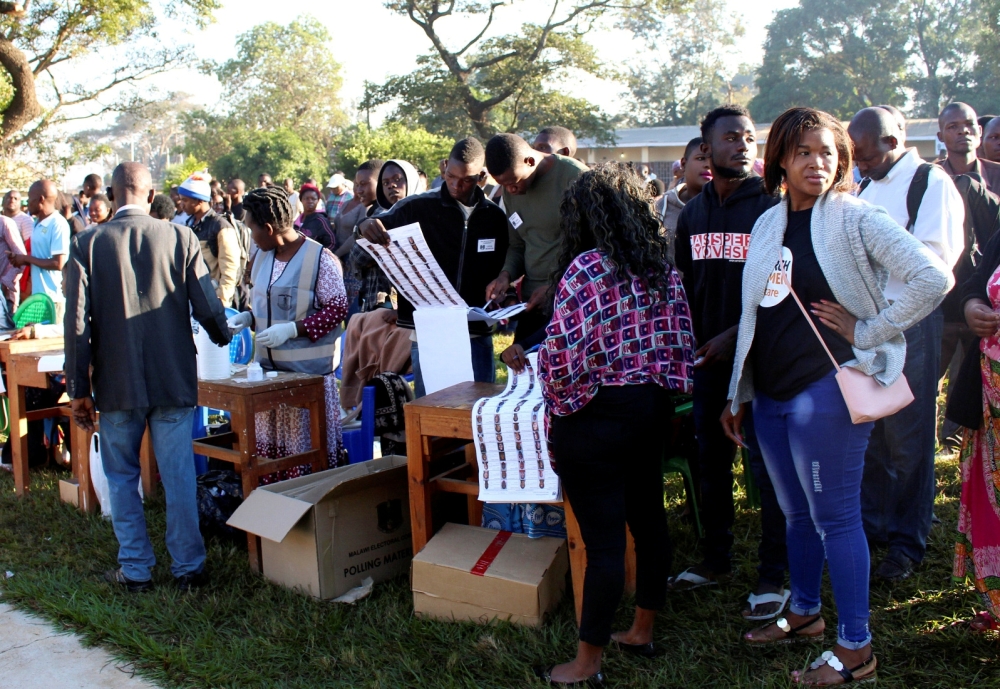 Voters queue to cast their ballots in Malawi's presidential and legislative elections, in Lilongwe, Malawi, in this May 21, 2019 file photo. — Reuters