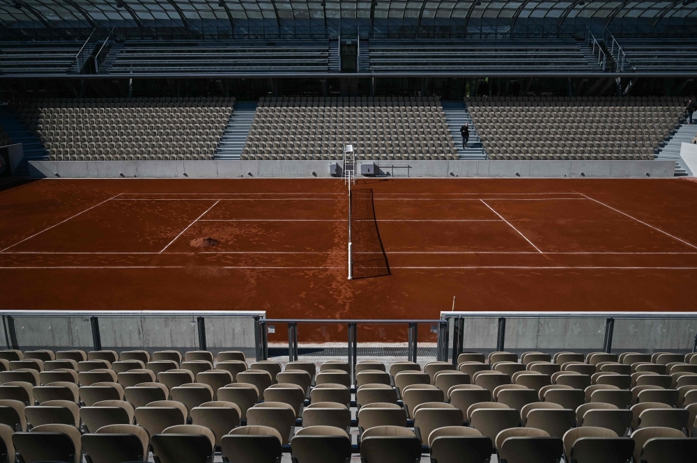 This file photo shows the new Simonne Mathieu tennis court after its inauguration ceremony at Roland Garros in Paris. After years of legal battles and threats to quit its historic home, Roland Garros will show off its new look next week, with a nod to the Eiffel Tower and a Second World War resistance fighter while boasting enough plants and greenery to make even the most demanding environmentalist drool. Ninety years after it was built, the French Open's showpiece Court Philippe Chatrier was demolished soon after the 2018 event finished. — AFP