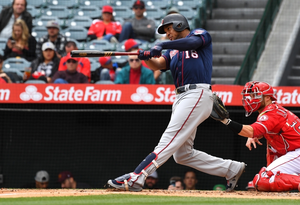 Jonathan Schoop No. 16 of the Minnesota Twins hits a three run home run in the second inning of the game off of starting pitcher Matt Harvey No. 33 of the Los Angeles Angels of Anaheim at Angel Stadium of Anaheim on Thursday in Anaheim, California. — AFP