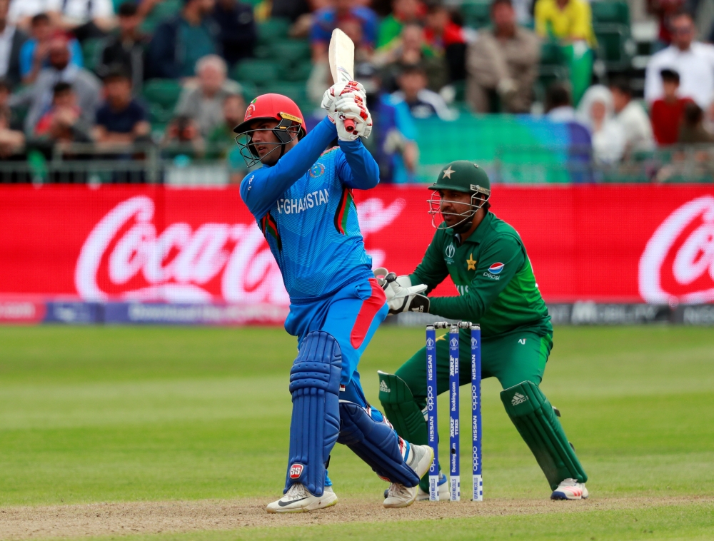 Afghanistan's Mohammad Nabi in action during the ICC Cricket World Cup warm-up match against Pakistan at the County Ground, Bristol, Britain, on Friday. — Reuters
