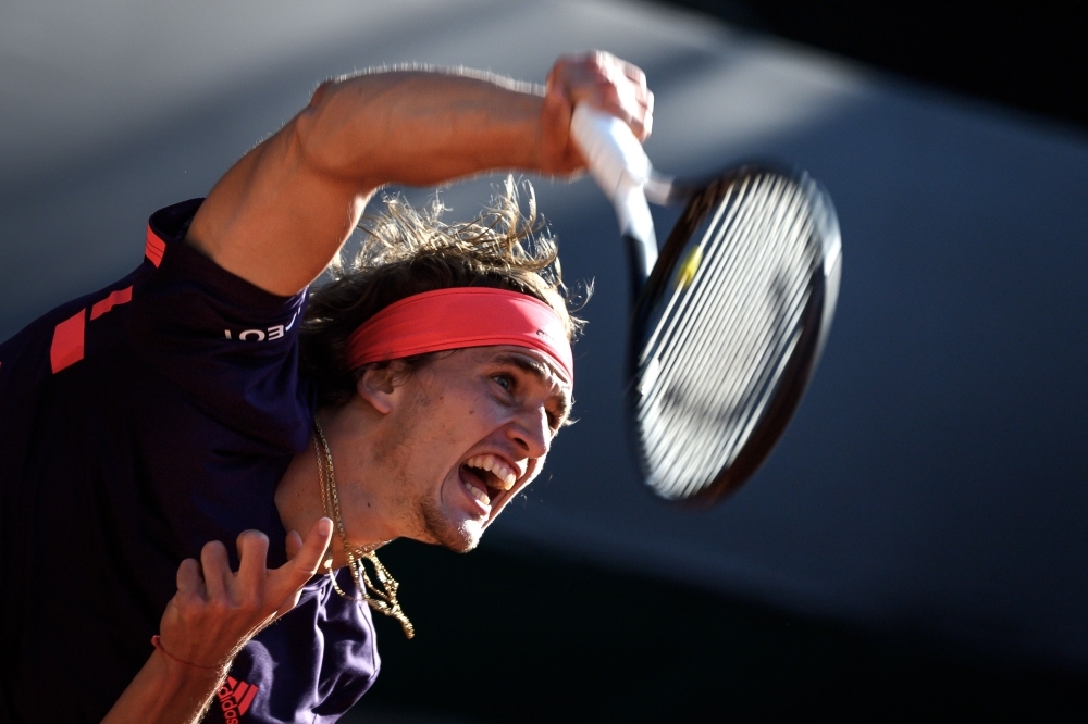 Germany's Alexander Zverev serves a ball to Bolivia's Hugo Dellien during their quarterfinal match at the Geneva Open ATP 250 tennis tournament, on Thursday in Geneva.   — AFP