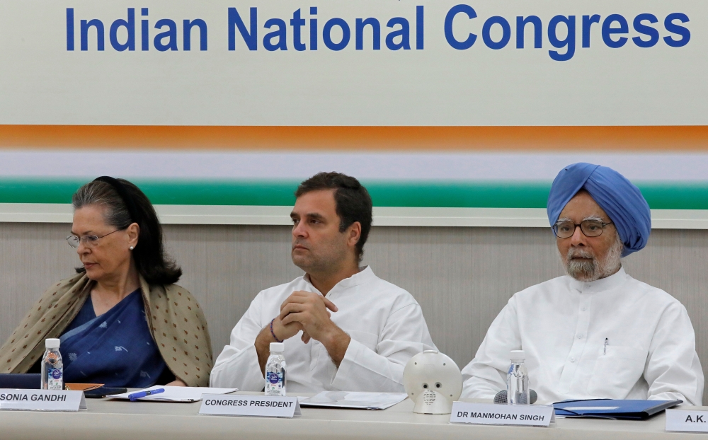 Rahul Gandhi, president of Congress party, his mother and leader of the party Sonia Gandhi and India's former prime minister Manmohan Singh attend a Congress Working Committee (CWC) meeting in New Delhi, Saturday. — Reuters