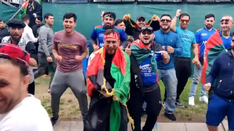 In this screen-grab photo, Afghanistan cricket fans celebrate their team's victory over Pakistan. — Courtesy photo