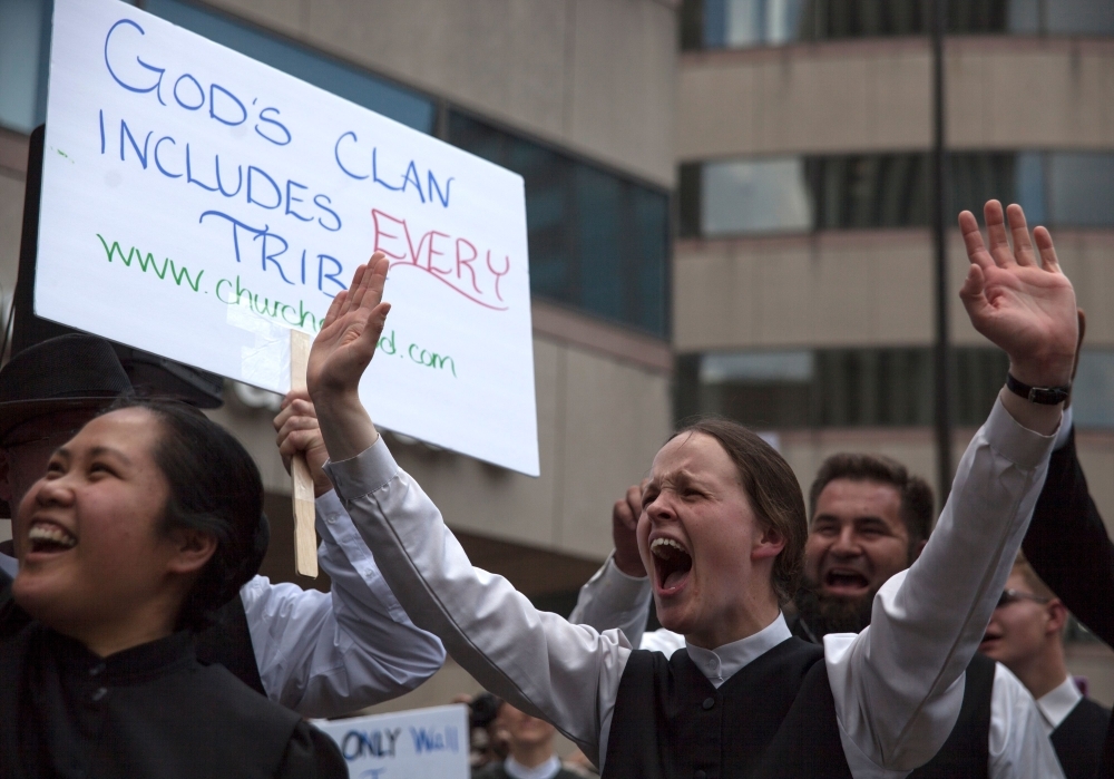 A counter protester shouts during a counter demostration of a small group from the KKK-affiliated Honorable Sacred Knights who gathered for a rally in Dayton, Ohio, on May 25. - AFP