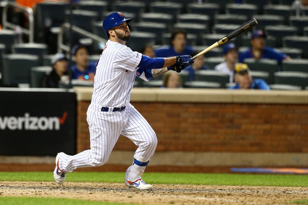 Tomas Nido of the New York Mets hits a walk-off home run in the 13th inning against the Detroit Tigers at Citi Field on Saturday in New York City. — AFP
