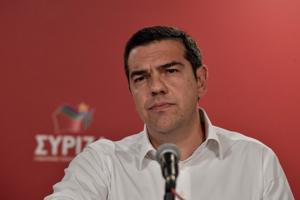 Greek Prime Minister Alexis Tsipras delivers a speech after the European parliamentary elections in Athens on Sunday. — AFP